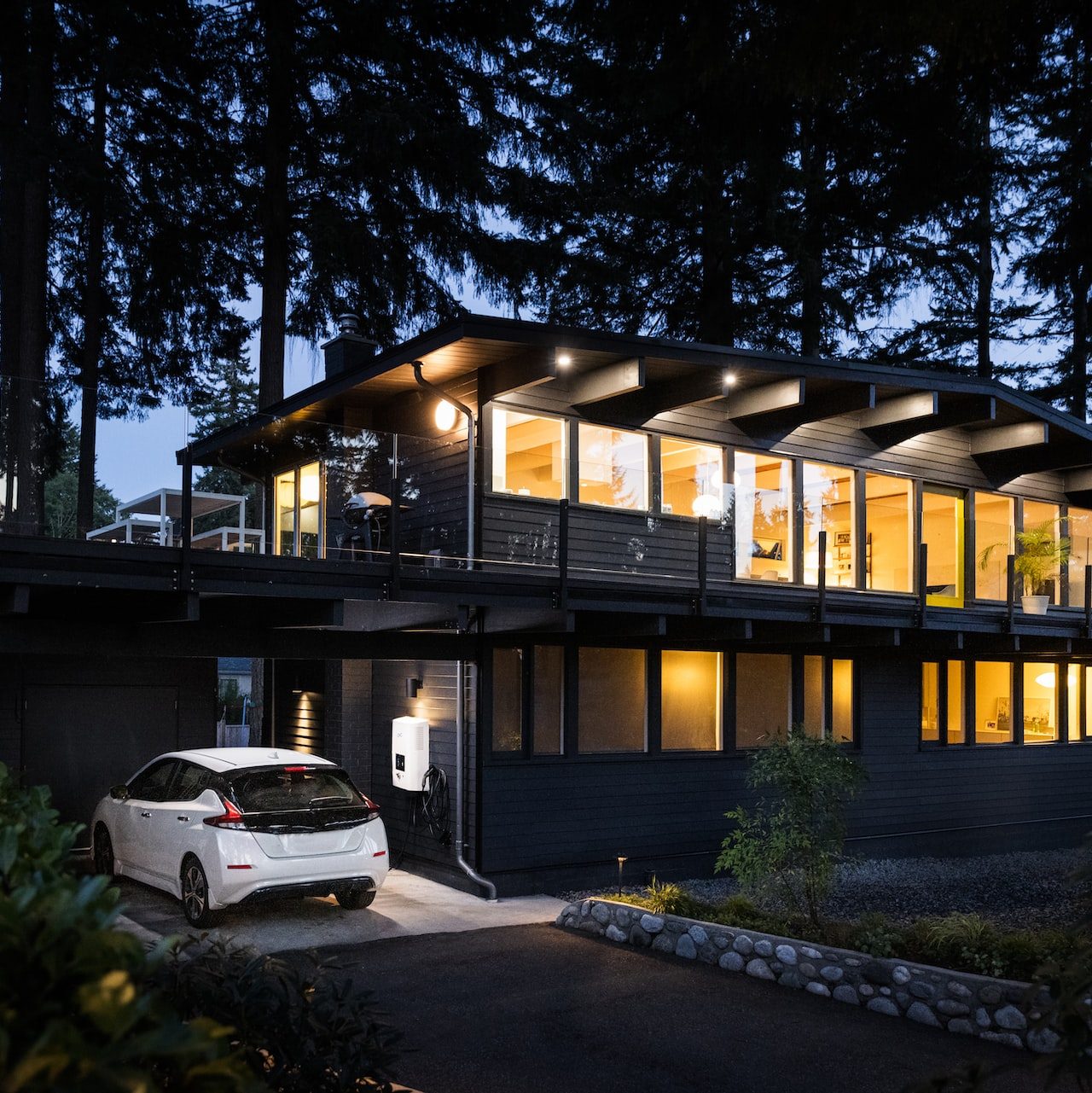 a car is parked in front of a house